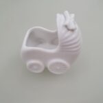 Carrinho de bebê com laço